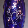 Lighted Blue Vase with Flowers