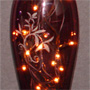 Lighted Mauve Vase with Flowers